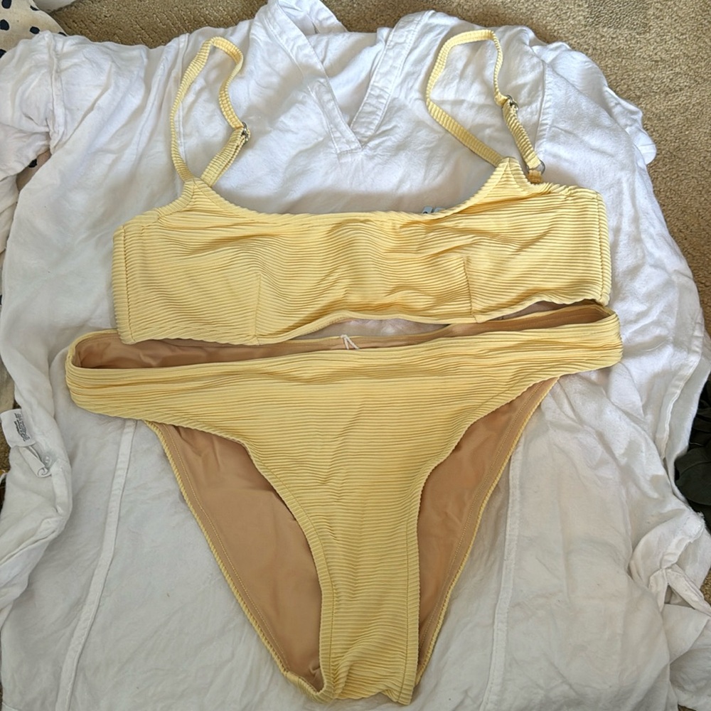 Brand new Zulu and Zephyr yellow bikini size 6.